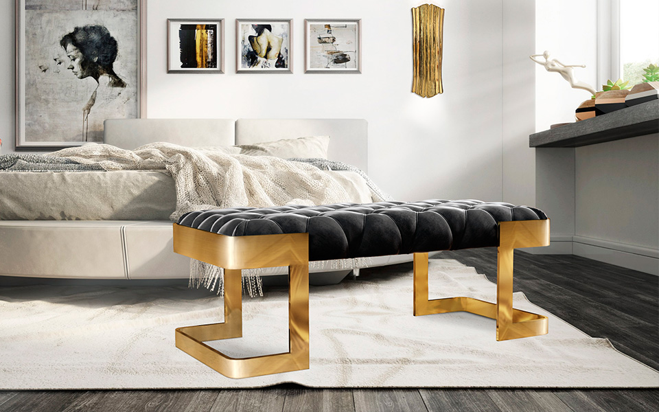 WINFREY BENCH The Winfrey bench has a solid and strong feminine touch. Featuring capitoné upholstery in black crystal velvet, this piece is embraced with a gold plated brass structure adding a special taste and synergy to any striking luxury interior project.