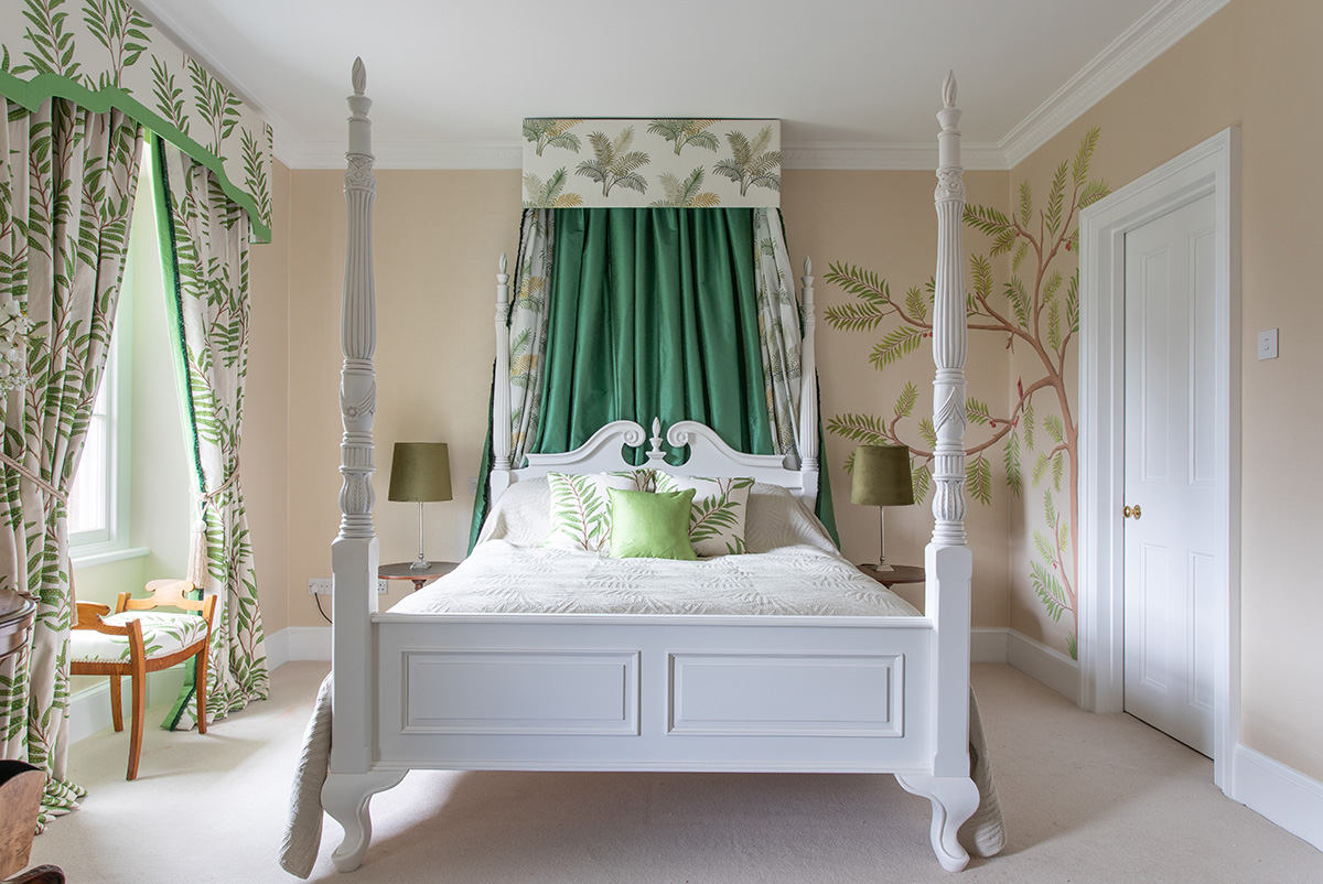 Four Poster Country Bed King Sized in a guest bedroom of a refurbished Cornwall Manor House.