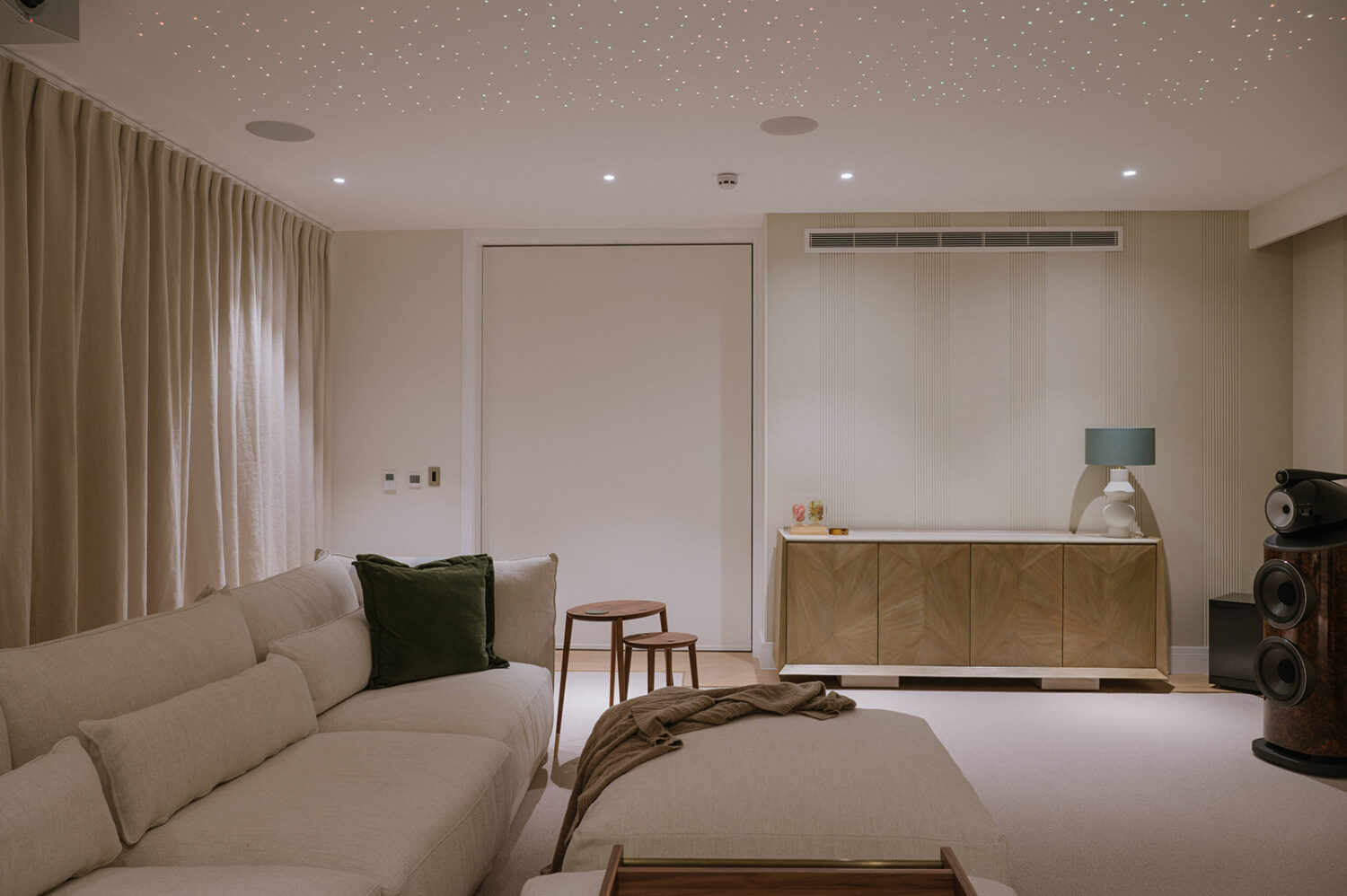 A wider view of the cinema room in a recently refurbished Hampstead home.